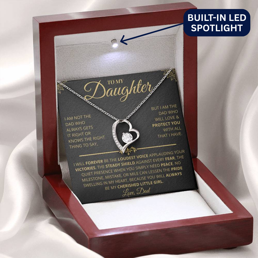 Necklace with heart design in a wooden display box with a built-in LED spotlight.