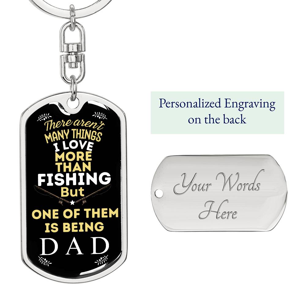 This image features a stylish swivel keychain adorned with a dog tag that bears the heartwarming inscription, "Love Being Dad." Resting on a black surface, the keychain blends practicality with sentiment, making it an ideal gift for fathers who take pride in their parenting journey. The durable design and heartfelt message make it a cherished accessory that fathers can carry with them, constantly reminding them of the joy and fulfillment that comes with being a dad.