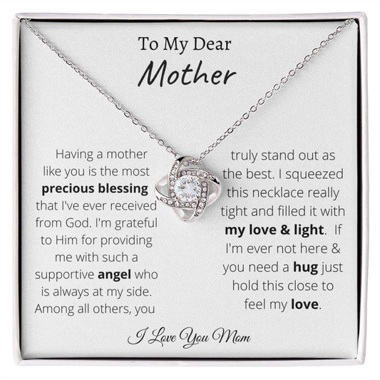 Surprise your mom with this stunning Love Knot Necklace and show her how much you care. This divine piece symbolizes an unbreakable bond between two souls, embellished with premium cubic zirconia crystals. Get free shipping today on orders over $50 for her birthday or any special occasion!