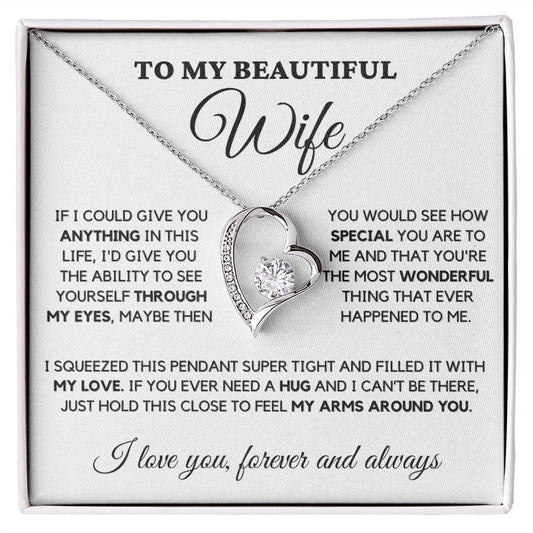 The Forever Love Necklace will make her heart skip a beat with its dazzling beauty! Featuring a gorgeous 6.5mm CZ crystal nestled within a polished heart-shaped pendant, accented with smaller crystals that add extra sparkle and shimmer, this necklace is the perfect gift for your true love. Beautifully crafted in either white or yellow gold, it's a timeless piece she can cherish forever.