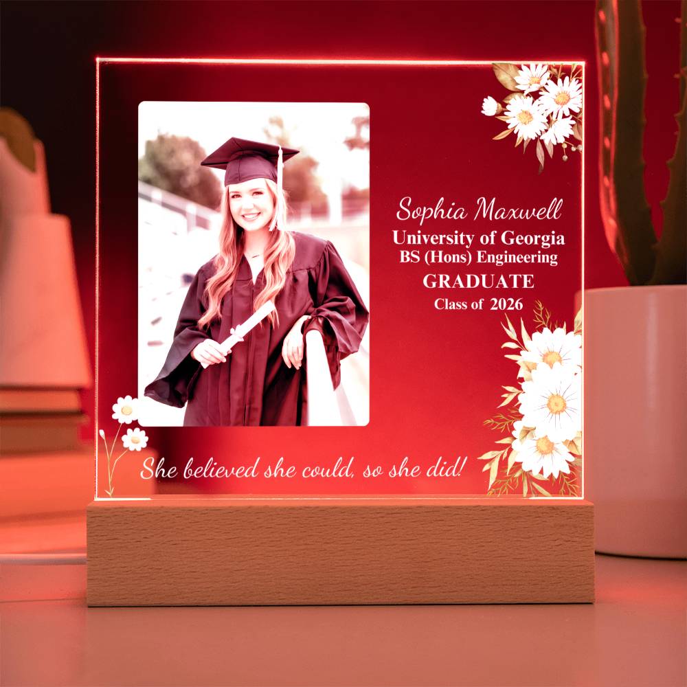 Graduation-themed decorative light box with a photo of a graduate and text on a red background.