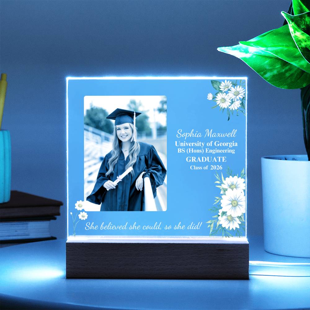 Graduation-themed LED light box with a photo of a graduate and text on a blue background.