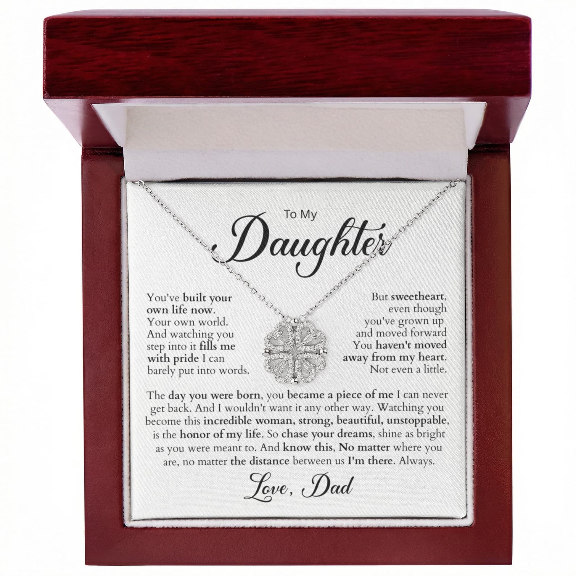 Elegant Magnetic Hearts Necklace presented in a soft-touch gift box — four magnetized crystal hearts join into a lucky-clover pendant.