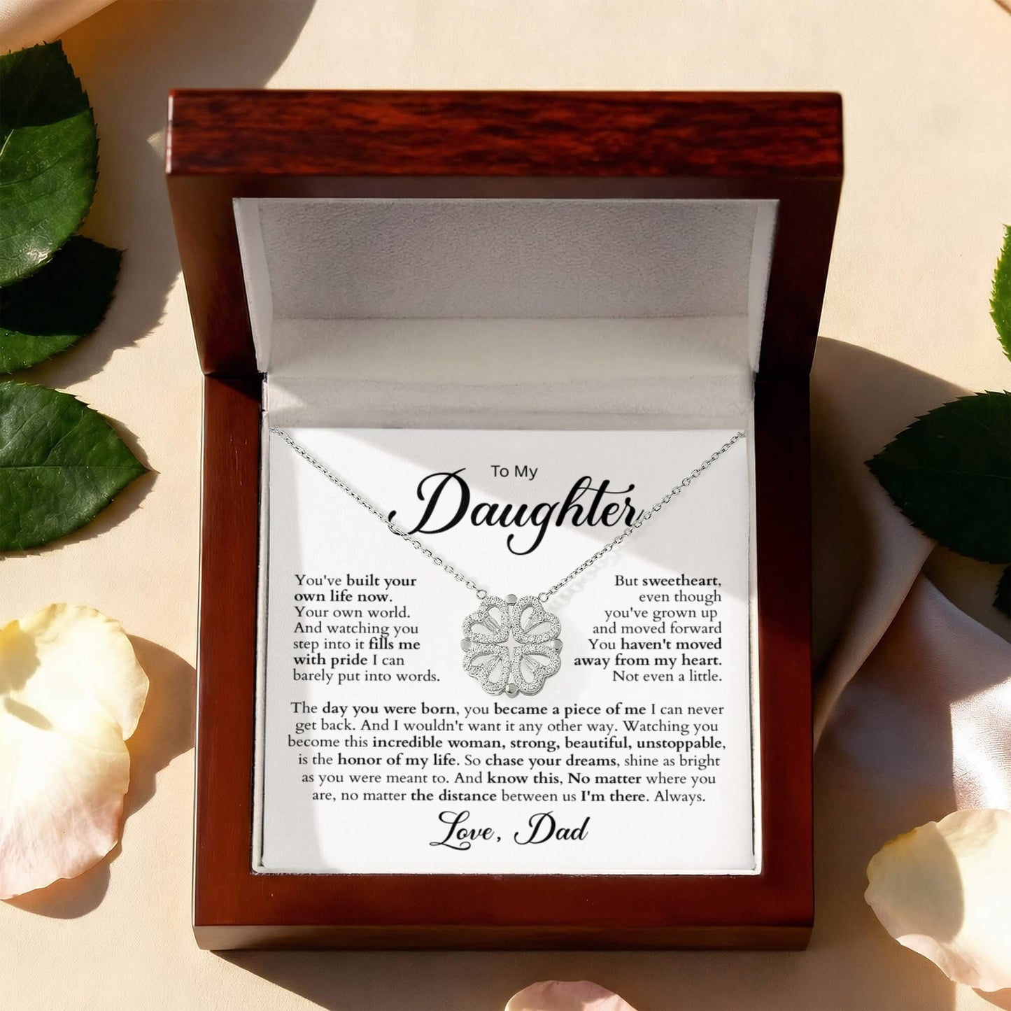 Elegant Magnetic Hearts Necklace featuring four crystal-embellished hearts that connect magnetically into a lucky-clover pendant; white-gold finish over brass on an adjustable stainless-steel chain; ships in a soft-touch gift box — ideal sentimental gift from dad to daughter.