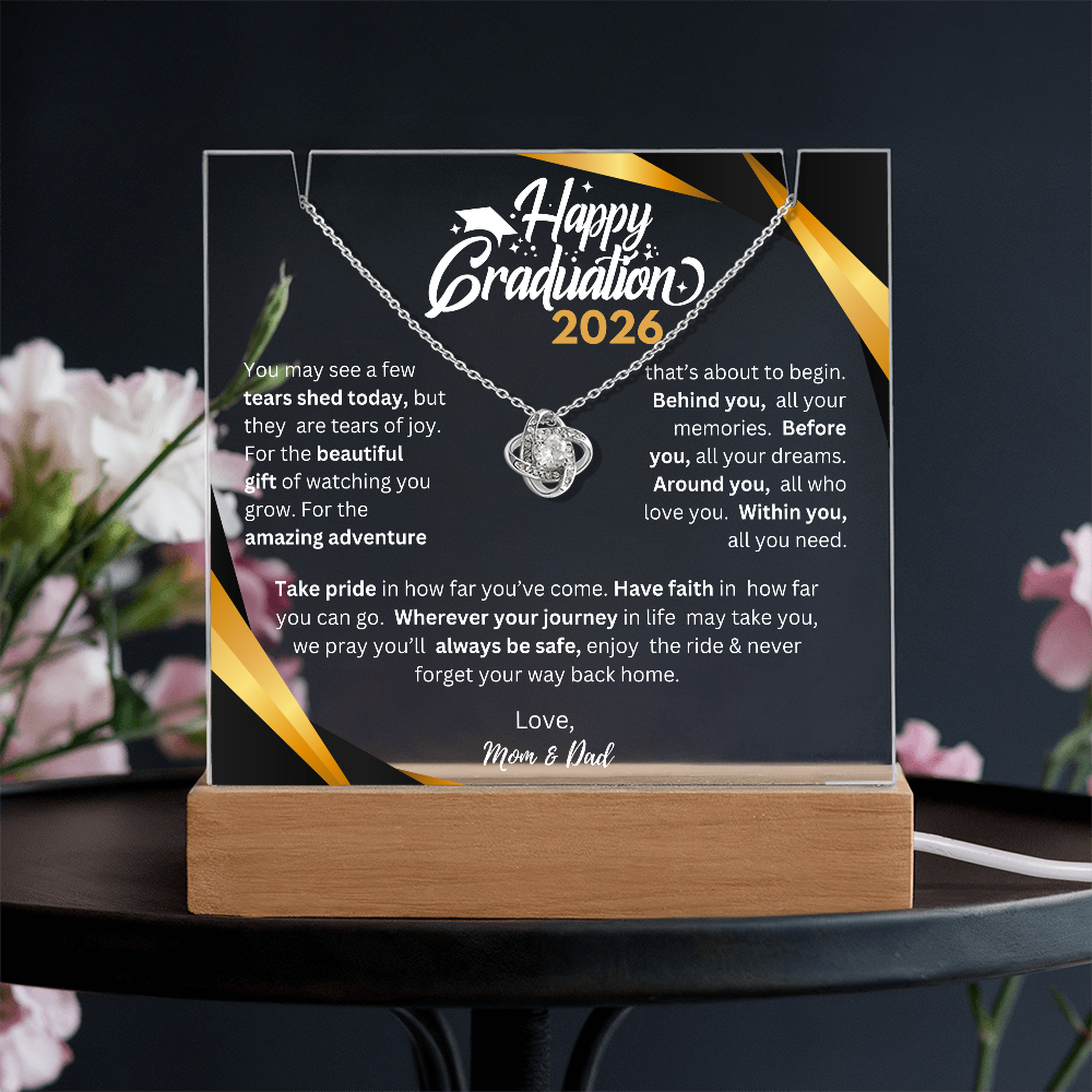 Personalized graduation keepsake: square acrylic plaque with graduate photo and message on a wooden LED base paired with a Love Knot Necklace.