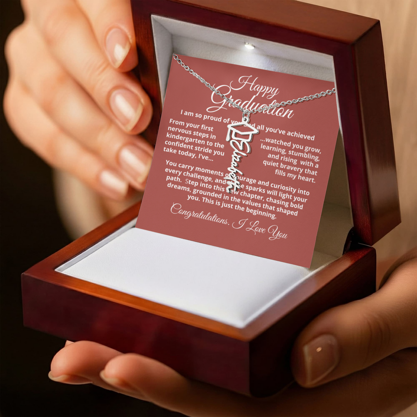 Custom name necklace with graduation cap charm — perfect keepsake for grads.