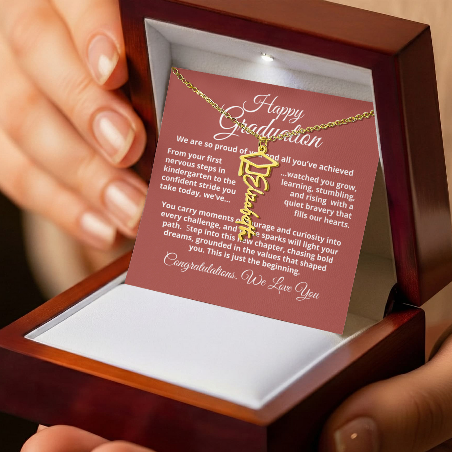 Custom name necklace with graduation cap charm — perfect keepsake for grads.