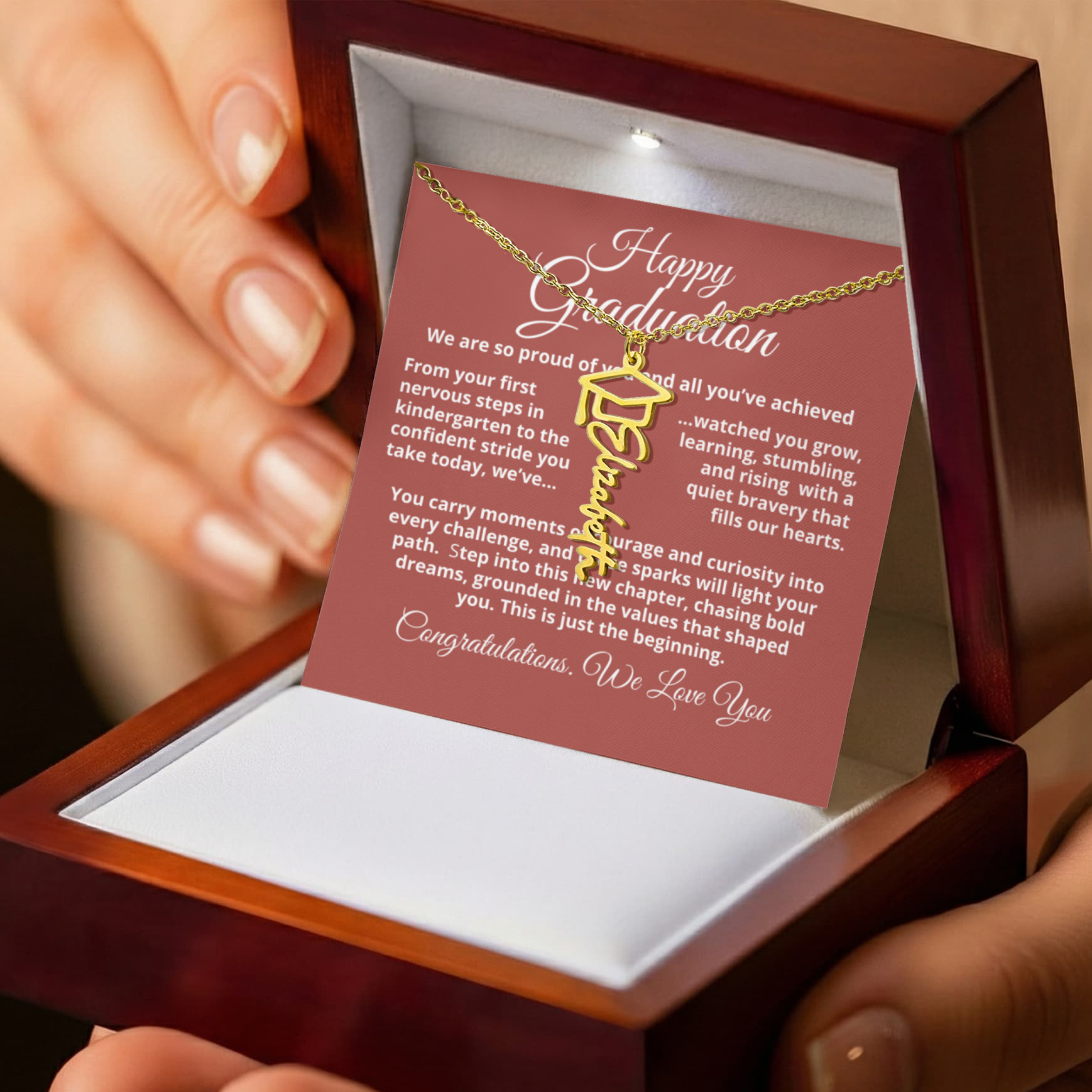 Custom name necklace with graduation cap charm — perfect keepsake for grads.