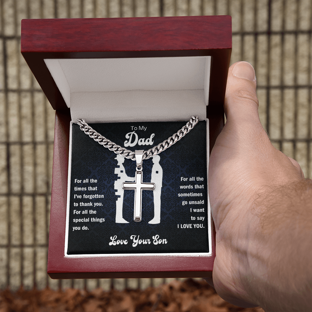 custom cross pendant with Cuban link chain close up