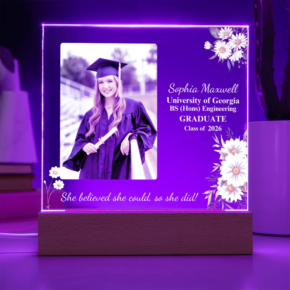Graduation-themed illuminated plaque with a photo of a graduate and text on a purple background