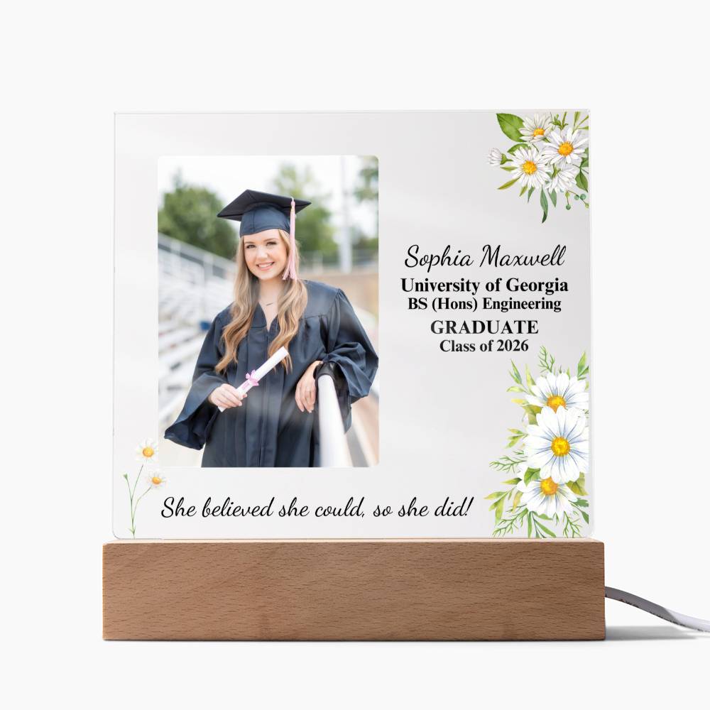 Graduation-themed photo frame with a portrait of a graduate and text on a white background